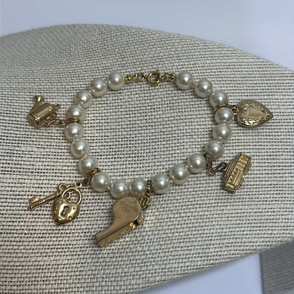 Faux White Pearl Beaded Gold tone Charm Bracelet